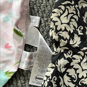 2 Boppy Floral and Damask Pillow Covers